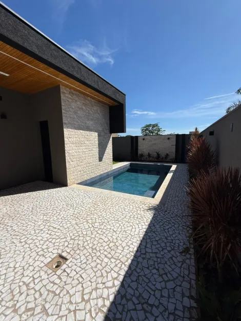 imagem 2 - Casa térrea de 4 suítes à venda no Condomínio Alphaville I, 262 m², Alphaville zona sul de Ribeirão Preto imagem 2 - Casa térrea de 4 suítes à venda no Condomínio Alphaville I, 262 m², Alphaville zona sul de Ribeirão Preto